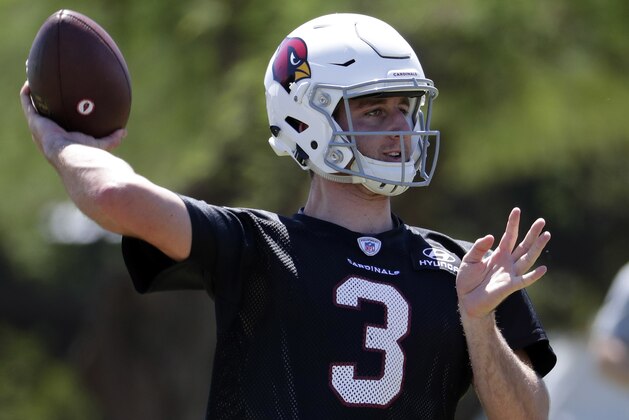 Arizona Cardinals quarterback Josh Rosen (3) throws during the NFL football team's organized team activity Wednesday, May 23, 2018, in Tempe, Ariz. (AP Photo/Matt York)