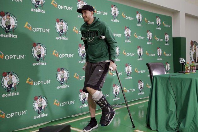 Boston Celtics' Gordon Hayward uses crutches as he steps away from a podium after taking questions from members of the media at an NBA basketball news conference, Thursday, Nov. 2, 2017 at the team's' training facility in Waltham, Mass. Hayward, who broke his ankle about 5 minutes into his NBA career opener at Cleveland on Oct. 17, says he knows he will not play again this season, after needing surgery to repair the injury. (AP Photo/Steven Senne)