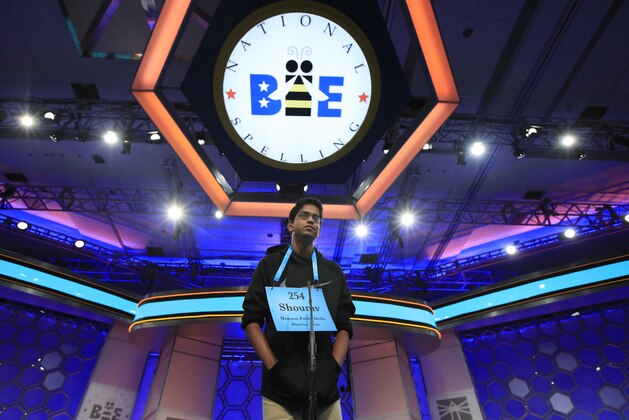 FILE - In this June 1, 2017 file photo, Shourav Dasari, 14, from Spring, Texas, correctly spells his word during the finals of the 90th Scripps National Spelling Bee, in Oxon Hill, Md.  This year’s super-sized bee, starting Tuesday, May 29, 2018 has three full days of spelling because Scripps allowed wild cards into the field for the first time. How the 516 competitors manage stress could play a bigger role than ever in who wins.(AP Photo/Jacquelyn Martin, File)