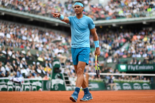 Spain's Rafael Nadal points between points against Italy's Simone Bolelli during their men's singles first round match on day three of The Roland Garros 2018 French Open tennis tournament in Paris on May 29, 2018. (Photo by CHRISTOPHE SIMON / AFP)        (Photo credit should read CHRISTOPHE SIMON/AFP/Getty Images)