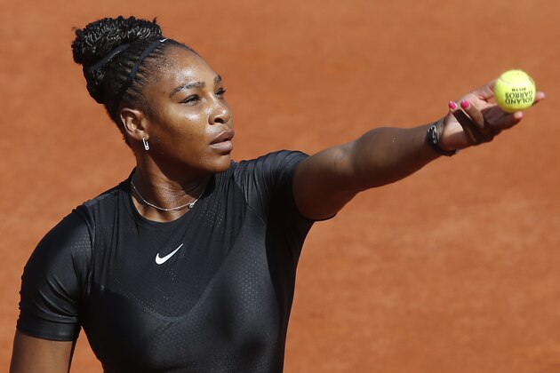 Serena Williams of the U.S. prepares to serve against Krystyna Pliskova of the Czech Republic during their first round match of the French Open tennis tournament at the Roland Garros stadium in Paris, France, Tuesday, May 29, 2018. (AP Photo/Michel Euler)