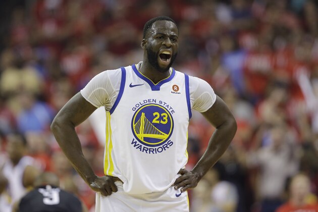Golden State Warriors forward Draymond Green (23) reacts after he was called for a foul against Houston Rockets guard James Harden during the first half of Game 1 of the NBA basketball Western Conference Finals, Monday, May 14, 2018, in Houston. (AP Photo/David J. Phillip)