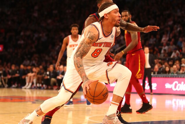 NEW YORK, NY - APRIL 09: Michael Beasley #8 of the New York Knicks handles the ball against Jeff Green #32 of the Cleveland Cavaliers in the second half at Madison Square Garden on April 9, 2018 in New York City. NOTE TO USER: User expressly acknowledges and agrees that, by downloading and or using this photograph, User is consenting to the terms and conditions of the Getty Images License Agreement.  (Photo by Mike Lawrie/Getty Images)