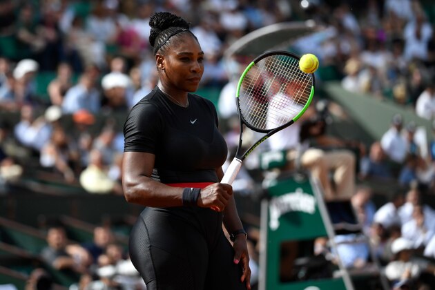 Serena Williams of the US looks on as she walks on court after a point against Czech Republic's Kristyna Pliskova during their women's singles first round match on day three of The Roland Garros 2018 French Open tennis tournament in Paris on May 29, 2018. (Photo by CHRISTOPHE SIMON / AFP)        (Photo credit should read CHRISTOPHE SIMON/AFP/Getty Images)