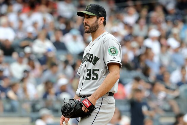 NEW YORK, NY - MAY 28:  Justin Verlander #35 of the Houston Astros reacts as he is pulled from the game in the seventh inning against the New York Yankees at Yankee Stadium on May 28, 2018 in the Bronx borough of New York City.MLB players across the league are wearing special uniforms to commemorate Memorial Day.  (Photo by Elsa/Getty Images)
