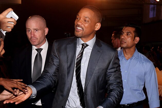 American Hollywood actor and producer Will Smith (C) attends the premier of his cop thriller movie 'Bright' in Mumbai on December 18, 2017. / AFP PHOTO / STR        (Photo credit should read STR/AFP/Getty Images)