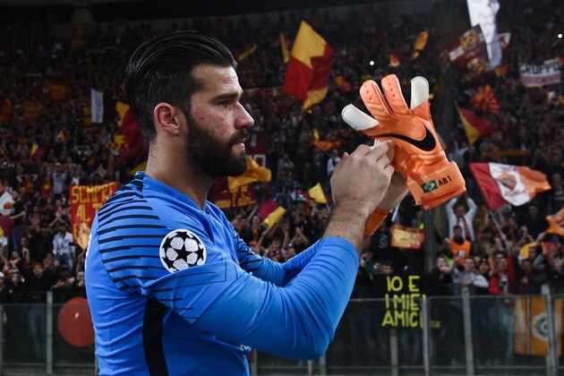 Roma's Brazilian goalkeeper Alisson acknowledges fans at the end of the UEFA Champions League semi-final second leg football match between AS Roma and Liverpool at the Olympic Stadium in Rome on May 2, 2018. (Photo by Filippo MONTEFORTE / AFP)        (Photo credit should read FILIPPO MONTEFORTE/AFP/Getty Images)