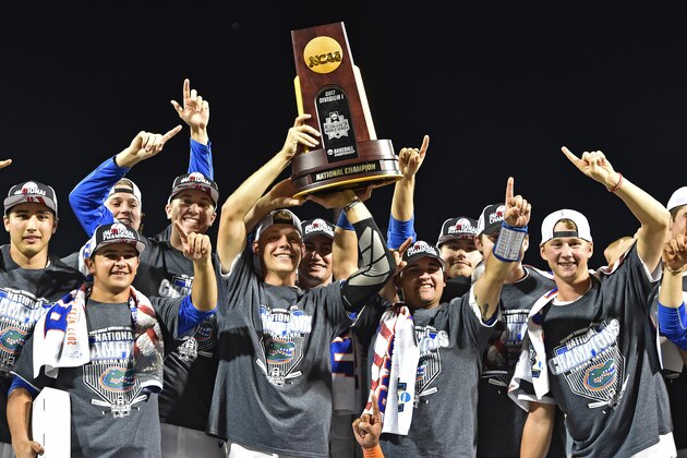 OMAHA, NE - JUNE 27:  Players of the Florida Gators hold up the National Championship Trophy after defeating the LSU Tigers 6-1  at the College World Series on June 27, 2017 at TD Ameritrade Park in Omaha, Nebraska.  (Photo by Peter Aiken/Getty Images)