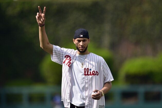 Philadelphia 76ers Ben Simmons gestures before throwing out a ceremonial first pitch prior to a baseball game between the Philadelphia Phillies and the Toronto Blue Jays, Saturday, May 26, 2018, in Philadelphia. (AP Photo/Derik Hamilton)