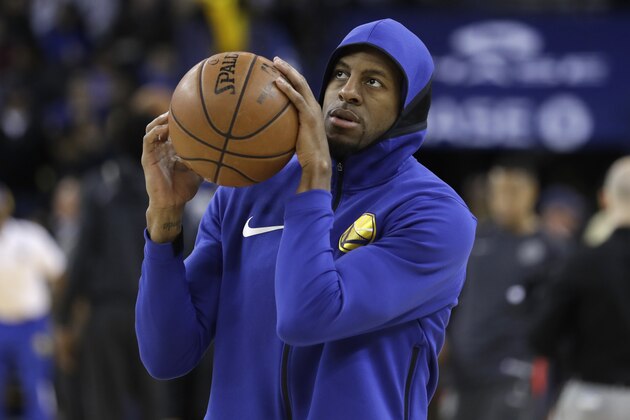 Golden State Warriors' Andre Iguodala warms up before an NBA basketball game against the Portland Trail Blazers Monday, Dec. 11, 2017, in Oakland, Calif. (AP Photo/Marcio Jose Sanchez)