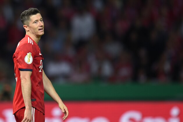 Bayern Munich's Polish striker Robert Lewandowski reacts during the German Cup DFB Pokal final football match FC Bayern Munich vs Eintracht Frankfurt at the Olympic Stadium in Berlin on May 19, 2018. (Photo by Christof STACHE / AFP) / RESTRICTIONS: ACCORDING TO DFB RULES IMAGE SEQUENCES TO SIMULATE VIDEO IS NOT ALLOWED DURING MATCH TIME. MOBILE (MMS) USE IS NOT ALLOWED DURING AND FOR FURTHER TWO HOURS AFTER THE MATCH. == RESTRICTED TO EDITORIAL USE == FOR MORE INFORMATION CONTACT DFB DIRECTLY AT +49 69 67880 /         (Photo credit should read CHRISTOF STACHE/AFP/Getty Images)