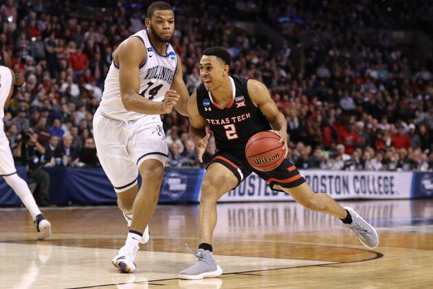 BOSTON, MA - MARCH 25:  Zhaire Smith #2 of the Texas Tech Red Raiders is defended by Omari Spellman #14 of the Villanova Wildcats during the second half in the 2018 NCAA Men's Basketball Tournament East Regional at TD Garden on March 25, 2018 in Boston, Massachusetts.  (Photo by Maddie Meyer/Getty Images)