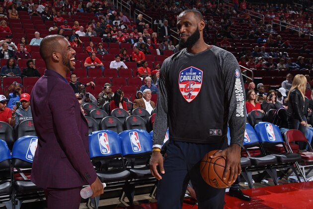 HOUSTON, TX - NOVEMBER 9:  Chris Paul #3 of the Houston Rockets talks with LeBron James #23 of the Cleveland Cavaliers on NOVEMBER 9, 2017 at the Toyota Center in Houston, Texas. NOTE TO USER: User expressly acknowledges and agrees that, by downloading and or using this photograph, User is consenting to the terms and conditions of the Getty Images License Agreement. Mandatory Copyright Notice: Copyright 2017 NBAE (Photo by Bill Baptist/NBAE via Getty Images)