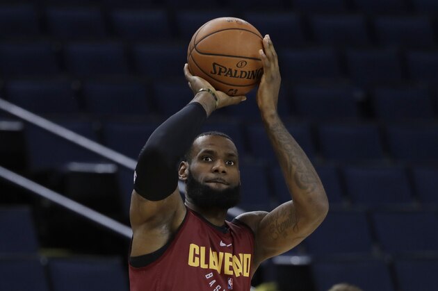 Cleveland Cavaliers' LeBron James shoots during an NBA basketball practice, Wednesday, May 30, 2018, in Oakland, Calif. The Cavaliers face the Golden State Warriors in Game 1 of the NBA Finals on Thursday in Oakland. (AP Photo/Marcio Jose Sanchez)