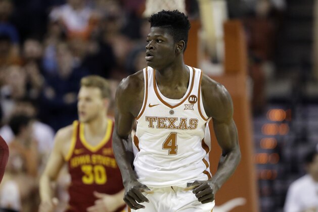 Texas forward Mohamed Bamba (4) runs up court during the first half of an NCAA college basketball game, Monday, Jan. 22, 2018, in Austin, Texas. (AP Photo/Eric Gay)