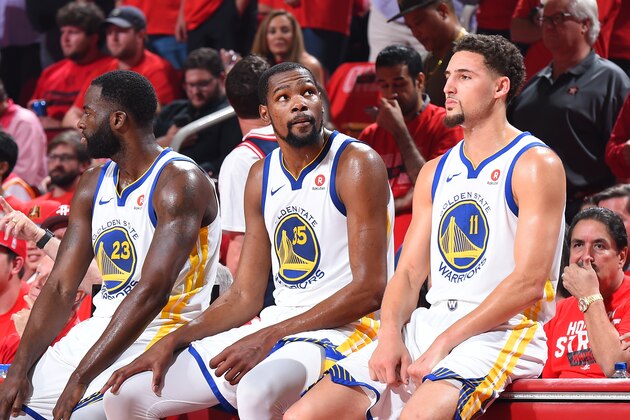 HOUSTON, TX - MAY 28: Draymond Green #23, Kevin Durant #35, and Klay Thompson #11 of the Golden State Warriors look on in Game Seven of the Western Conference Finals against the Houston Rockets during the 2018 NBA Playoffs on May 28, 2018 at the Toyota Center in Houston, Texas. NOTE TO USER: User expressly acknowledges and agrees that, by downloading and or using this photograph, User is consenting to the terms and conditions of the Getty Images License Agreement. Mandatory Copyright Notice: Copyright 2018 NBAE (Photo by Andrew D. Bernstein/NBAE via Getty Images)