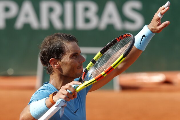 Spain's Rafael Nadal waves after defeating Argentina's Guido Pella during their second round match of the French Open tennis tournament at the Roland Garros stadium, Thursday, May 31, 2018 in Paris. (AP Photo/Michel Euler)