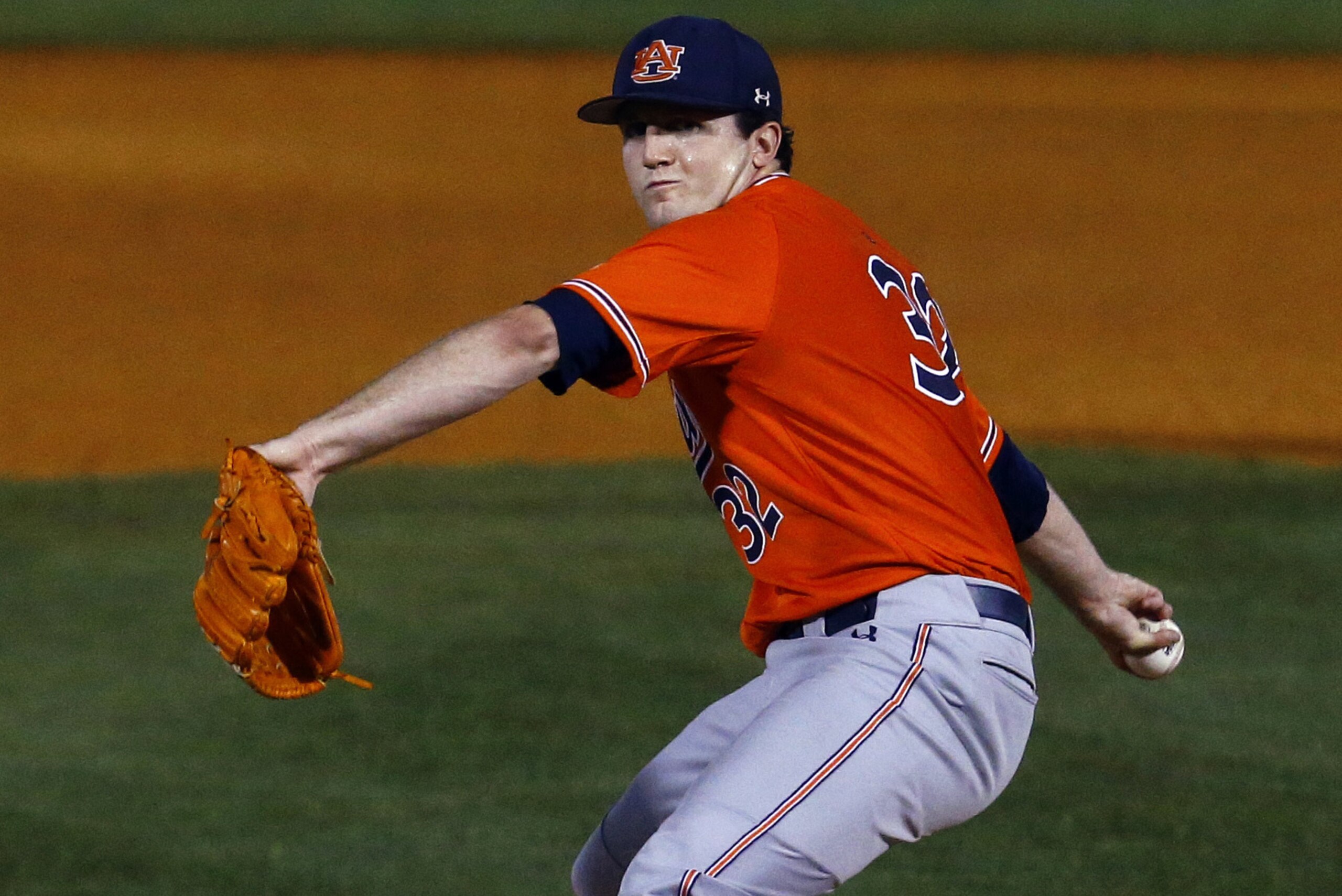 Auburn pitcher Casey Mize throws during the first inning of a Southeastern Conference tournament NCAA college baseball game against Texas A&M, Thursday, May 24, 2018, in Hoover, Ala. (AP Photo/Butch Dill)