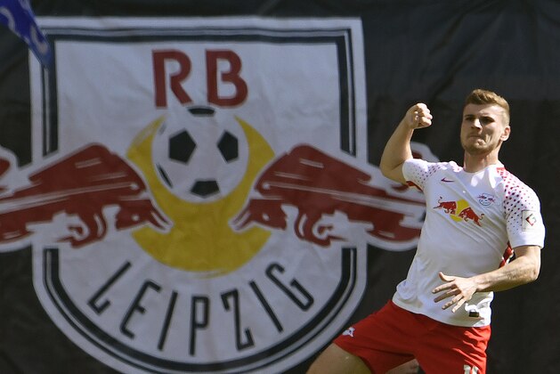 Leipzig's Timo Werner celebrates after scoring a goal during the German first division Bundesliga soccer match between RB Leipzig and VfL Wolfsburg in Leipzig, Germany, Saturday, May 5, 2018. (AP Photo/Jens Meyer)