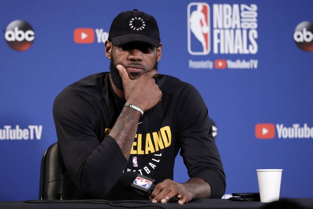 Cleveland Cavaliers' LeBron James fields questions before an NBA basketball practice, Wednesday, May 30, 2018, in Oakland, Calif. The Cavaliers face the Golden State Warriors in Game 1 of the NBA Finals on Thursday in Oakland. (AP Photo/Marcio Jose Sanchez)