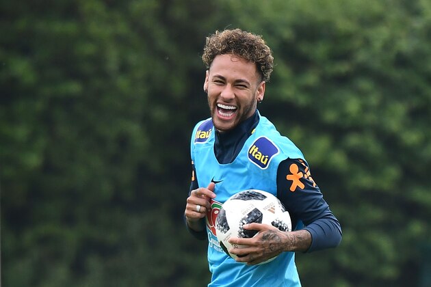 Brazil's striker Neymar laughs during a training session at Tottenham Hotspur's Enfield Training Centre, north-east of London, on May 30, 2018 ahead their international friendly football match against Croatia. (Photo by Ben STANSALL / AFP)        (Photo credit should read BEN STANSALL/AFP/Getty Images)
