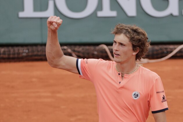 Germany's Alexander Zverev celebrates after victory over Bosnia-Herzegovina's Damir Dzumhur at the end of their men's singles third round match, on day six of The Roland Garros 2018 French Open tennis tournament in Paris on June 1, 2018. (Photo by Thomas SAMSON / AFP)        (Photo credit should read THOMAS SAMSON/AFP/Getty Images)