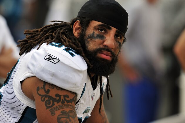 Jacksonville Jaguars defensive end Austen Lane (92) watches the jumbo screen in the fourth quarter of an NFL football game against the Cincinnati Bengals, Sunday, Oct. 9, 2011, in Jacksonville, Fla. The Bengals beat the Jaguars 30-20. (AP Photo/Stephen Morton)