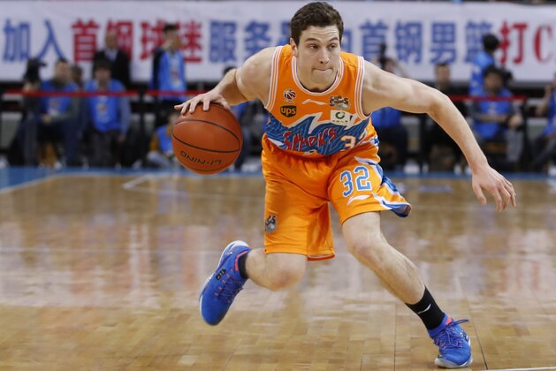 BEIJING,  CHINA - MARCH 04:  Jimmer Fredette #32 of Shanghai Bilibili in action during the 2017/2018 CBA League match between Beijing Ducks and Shanghai Bilibili at Cadillac Arena on March 4,  2018 in Beijing,  China.  (Photo by XIN LI/Getty Images)