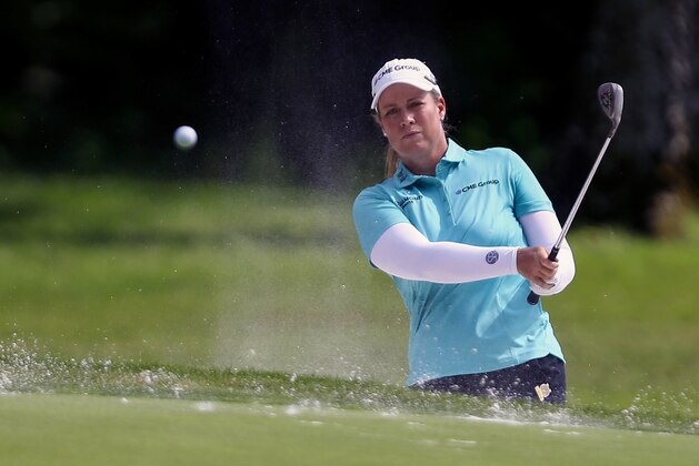 Brittany Lincicome watches her shot out of the bunker to the sixth green during the first round of the U.S. Women's Open golf tournament, Thursday, May 31, 2018, in Shoal Creek, Ala. Lincicome is set to join the club of female professionals playing in a PGA Tour event. Lincicome said Friday at the U.S. Women's Open that she was asked to play in the Barbasol Championship in Kentucky July 19-22.  (AP Photo/Butch Dill)
