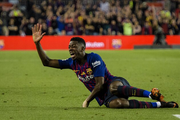 BARCELONA, SPAIN - MAY 20: Ousmane Dembele of FC Barcelona lies injured on the pitch during the La Liga match between Barcelona and Real Sociedad at Camp Nou on May 20, 2018 in Barcelona, . (Photo by Power Sport Images/Getty Images)