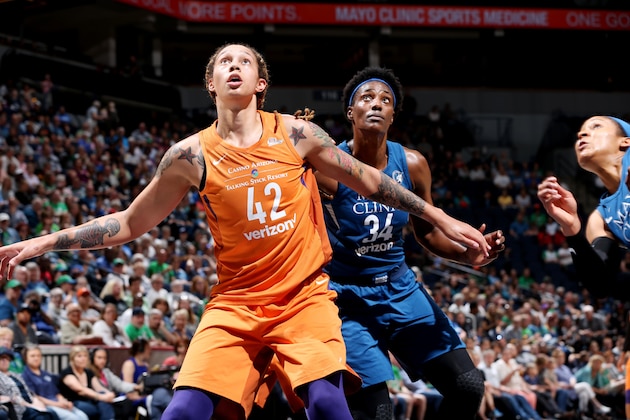 MINNEAPOLIS, MN -  JUNE 1:  Brittney Griner #42 of the Phoenix Mercury and Sylvia Fowles #34 of the Minnesota Lynx box out during the game between the two teams on June 1, 2018 at Target Center in Minneapolis, Minnesota. NOTE TO USER: User expressly acknowledges and agrees that, by downloading and or using this Photograph, user is consenting to the terms and conditions of the Getty Images License Agreement. Mandatory Copyright Notice: Copyright 2018 NBAE (Photo by David Sherman/NBAE via Getty Images)