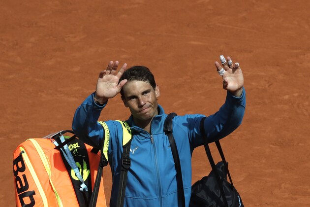 Spain's Rafael Nadal leaves the court after defeating France's Richard Gasquet during their third round match of the French Open tennis tournament at the Roland Garros stadium, Saturday, June 2, 2018 in Paris. Nadal won 6-3, 6-2, 6-2. (AP Photo/Alessandra Tarantino)