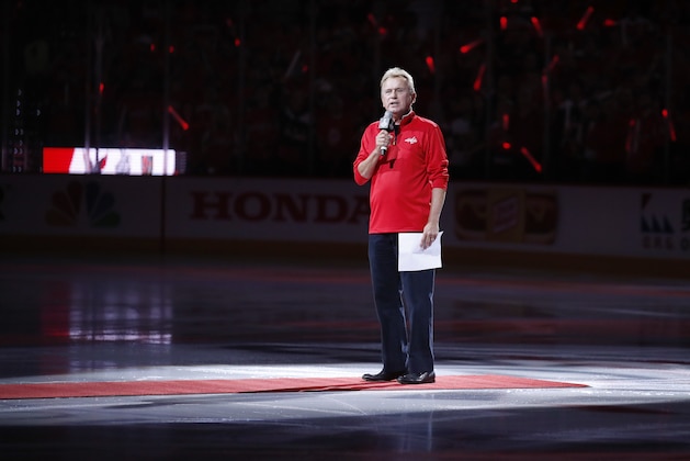 Entertainer Pat Sajak, a Washington Capitals season ticket holder, introduces the players for the Capitals and the Vegas Golden Knights before Game 3 of the NHL hockey Stanley Cup Final, Saturday, June 2, 2018, in Washington. (AP Photo/Alex Brandon)