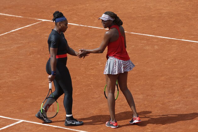 Serena Williams of the U.S., left, and her sister Venus Williams plays Slovenia's Andreja Klepac and Spain's Maria Jose Martinez Sanchez during their double match of the French Open tennis tournament at the Roland Garros stadium, Sunday, June 3, 2018 in Paris. (AP Photo/Michel Euler) Serena Williams of the U.S., left, and her sister Venus Williams plays Slovenia's Andreja Klepac and Spain's Maria Jose Martinez Sanchez during their double match of the French Open tennis tournament at the Roland Garros stadium, Sunday, June 3, 2018 in Paris. (AP Photo/Michel Euler)