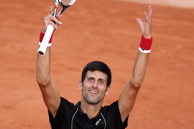 Serbia's Novak Djokovic cheers the audience after defeating Spain's Fernando Verdasco during their fourth round match of the French Open tennis tournament at the Roland Garros stadium, Sunday, June 3, 2018 in Paris. (AP Photo/Christophe Ena) Serbia's Novak Djokovic cheers the audience after defeating Spain's Fernando Verdasco during their fourth round match of the French Open tennis tournament at the Roland Garros stadium, Sunday, June 3, 2018 in Paris. (AP Photo/Christophe Ena)