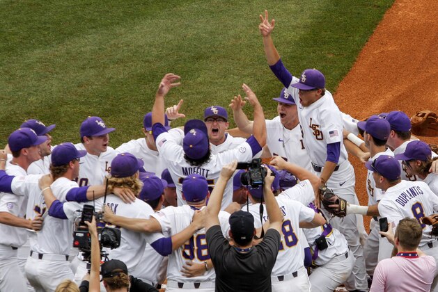 LSU's Clay Moffitt leads the team in a pre game cheer before the start of the Southeastern Conference tournament NCAA college baseball championship game against Mississippi, Sunday, May 27, 2018, in Hoover, Ala. (AP Photo/Butch Dill)