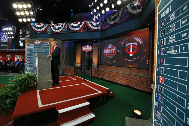 SECAUCUS, NJ - JUNE 5: Commissioner Allan H. Bud Selig announces the fifth overall pick of Nick Gordon by the Minnesota Twins during the MLB First-Year Player Draft at the MLB Network Studio on June 5, 2014 in Secacucus, New Jersey. (Photo by Rich Schultz/Getty Images)