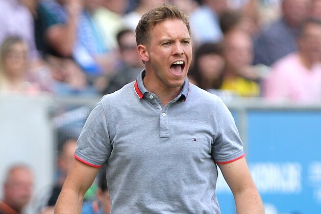 Hoffenheim's coach Julian Nagelsmann reacts during the German first division Bundesliga football match TSG 1899 Hoffenheim vs Borussia Dortmund in Sinsheim, southern Germany, on May 12, 2018. (Photo by Amelie QUERFURTH / AFP) / RESTRICTIONS: DURING MATCH TIME: DFL RULES TO LIMIT THE ONLINE USAGE TO 15 PICTURES PER MATCH AND FORBID IMAGE SEQUENCES TO SIMULATE VIDEO. == RESTRICTED TO EDITORIAL USE == FOR FURTHER QUERIES PLEASE CONTACT DFL DIRECTLY AT + 49 69 650050        (Photo credit should read AMELIE QUERFURTH/AFP/Getty Images)