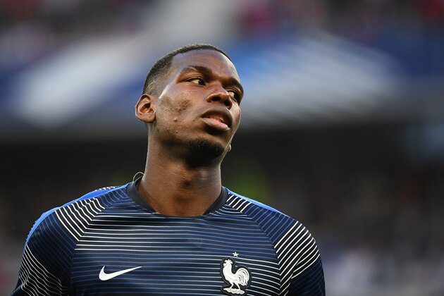 France's midfielder Paul Pogba warms up prior to the  friendly football match between France and Italy at the Allianz Riviera Stadium in Nice, southeastern France, on June 1, 2018. (Photo by FRANCK FIFE / AFP)        (Photo credit should read FRANCK FIFE/AFP/Getty Images)
