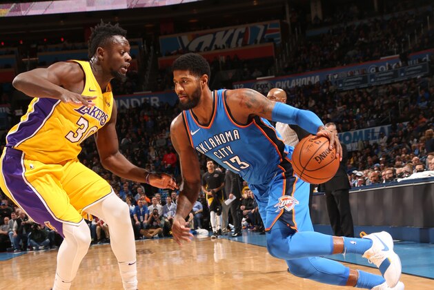 OKLAHOMA CITY, OK - JANUARY 17: Paul George #13 of the Oklahoma City Thunder handles the ball during the game against the Los Angeles Lakers on January 17, 2018 at Chesapeake Energy Arena in Oklahoma City, Oklahoma. NOTE TO USER: User expressly acknowledges and agrees that, by downloading and or using this photograph, User is consenting to the terms and conditions of the Getty Images License Agreement. Mandatory Copyright Notice: Copyright 2018 NBAE (Photo by Layne Murdoch/NBAE via Getty Images) OKLAHOMA CITY, OK - JANUARY 17: Paul George #13 of the Oklahoma City Thunder handles the ball during the game against the Los Angeles Lakers on January 17, 2018 at Chesapeake Energy Arena in Oklahoma City, Oklahoma. NOTE TO USER: User expressly acknowledges and agrees that, by downloading and or using this photograph, User is consenting to the terms and conditions of the Getty Images License Agreement. Mandatory Copyright Notice: Copyright 2018 NBAE (Photo by Layne Murdoch/NBAE via Getty Images)