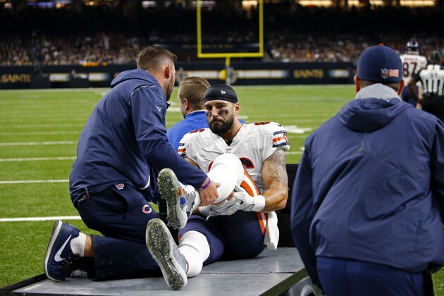 Chicago Bears tight end Zach Miller (86) taken off the field on a cart, after injuring his leg in the second half of an NFL football game against the New Orleans Saints in New Orleans, Sunday, Oct. 29, 2017. Miller hurt his leg on an apparent touchdown reception that was overturned on review. (AP Photo/Butch Dill)
