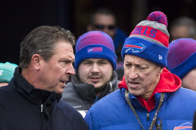 ORCHARD PARK, NY - DECEMBER 17:  Hall of Fame quarterbacks Dan Marino (left) and Jim Kelly (right) talk before the game between the Buffalo Bills and the Miami Dolphins at New Era Field on December 17, 2017 in Orchard Park, New York. Buffalo defeats Miami 24-16.  (Photo by Brett Carlsen/Getty Images)