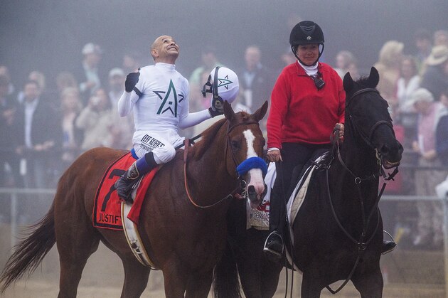 BALTIMORE, MD - MAY 19: Mike Smith celebrates after winning the Preakness Stakes aboard Justify, #7, at Pimlico Race Course on May 19, 2018 in Baltimore, Maryland (Photo by Alex Evers/Eclipse Sportswire/Getty Images)