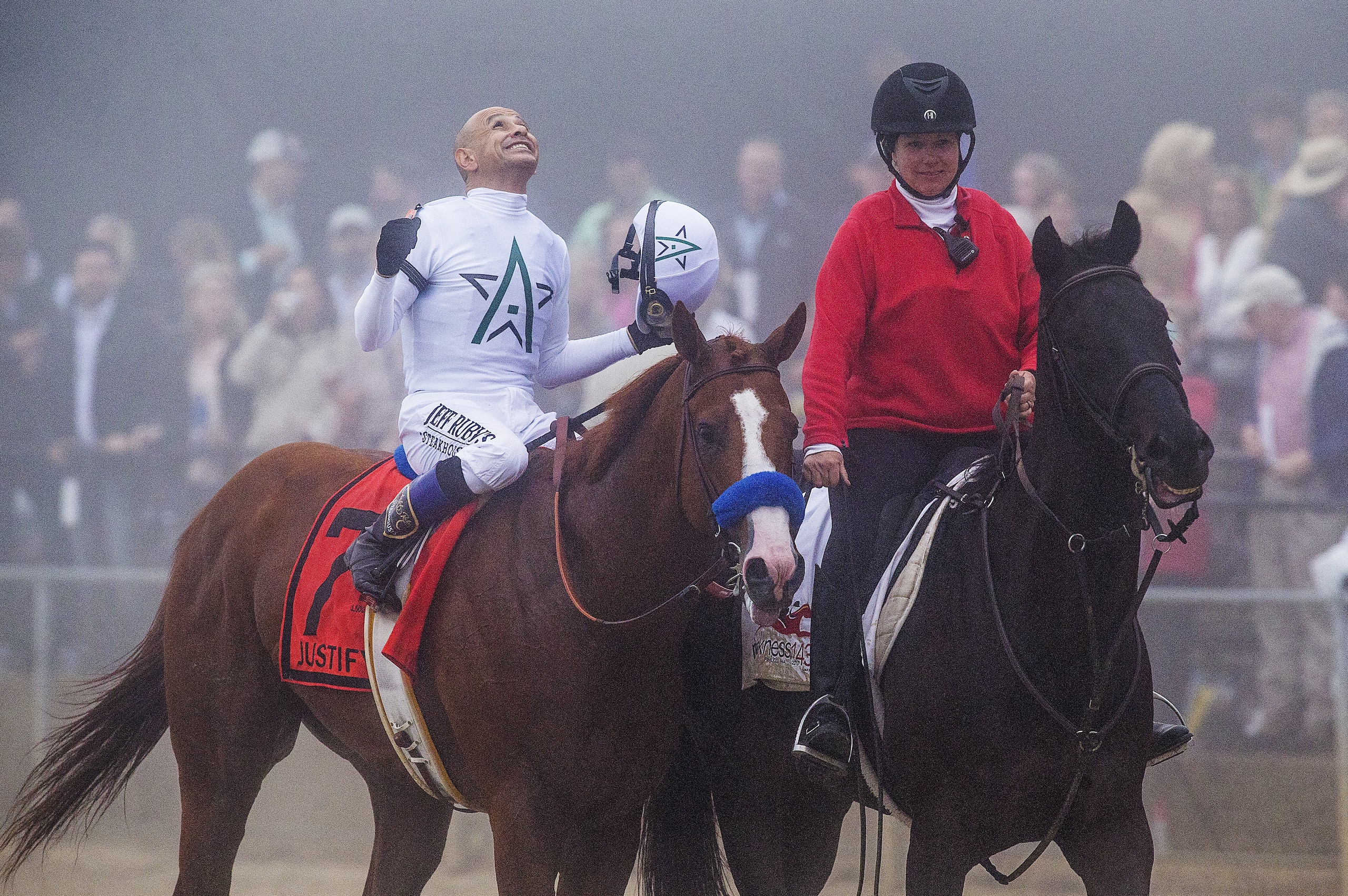 BALTIMORE, MD - MAY 19: Mike Smith celebrates after winning the Preakness Stakes aboard Justify, #7, at Pimlico Race Course on May 19, 2018 in Baltimore, Maryland (Photo by Alex Evers/Eclipse Sportswire/Getty Images)