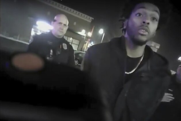 This Jan. 26, 2018 police body-camera footage released by Milwaukee Police Department shows NBA Bucks guard Sterling Brown talks to arresting police officers after being shot by a stun gun in a Walgreens parking lot in Milwaukee. The release comes as city officials who've viewed the videos have expressed concern about how officers conducted themselves. Even leaders of the police department have hinted the video may make them look bad. (Milwaukee Police Department via AP)