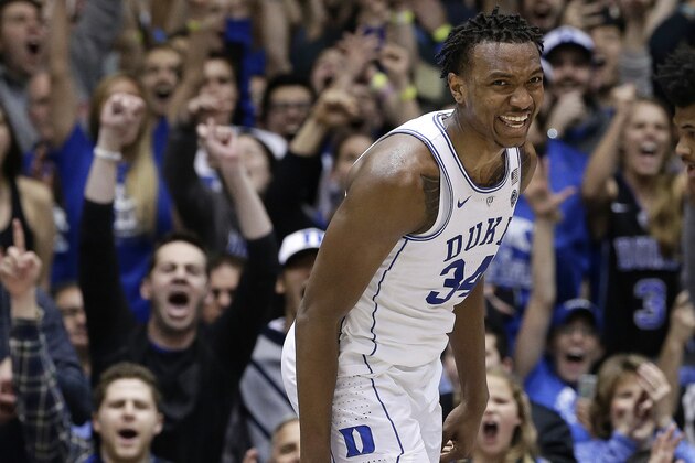 Duke's Wendell Carter Jr. (34) reacts following a dunk against Notre Dame during the second half of an NCAA college basketball game in Durham, N.C., Monday, Jan. 29, 2018. Duke won 88-66. (AP Photo/Gerry Broome)