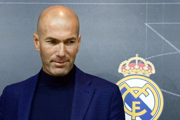 TOPSHOT - Real Madrid's French coach Zinedine Zidane looks on after a press conference to announce his resignation in Madrid on May 31, 2018. - Real Madrid coach Zinedine Zidane said today he was leaving the Spanish giants, just days after winning the Champions League for the third year in a row. (Photo by PIERRE-PHILIPPE MARCOU / AFP)        (Photo credit should read PIERRE-PHILIPPE MARCOU/AFP/Getty Images)