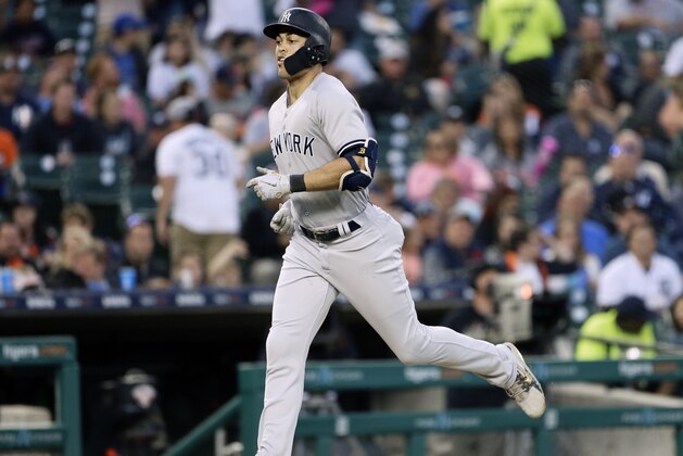 DETROIT, MI - JUNE 4:  Giancarlo Stanton #27 of the New York Yankees rounds the bases after hitting a home run against the Detroit Tigers during the sixth inning of game two of a doubleheader at Comerica Park on June 4, 2018 in Detroit, Michigan. Players on both teams are wearing the number 42 to celebrate Jackie Robinson Day, as it is the makeup of the game rained out on April 15. (Photo by Duane Burleson/Getty Images)