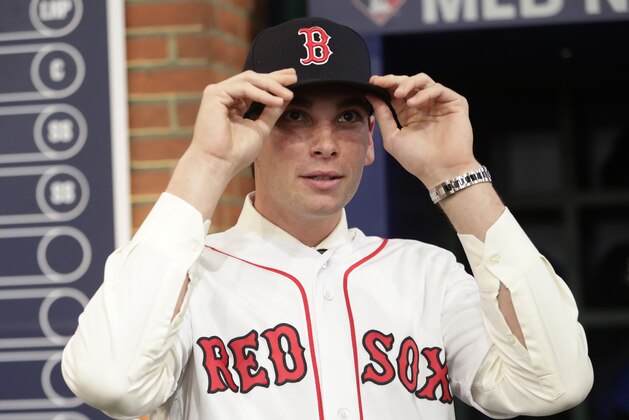 Triston Casas, a first baseman from American Heritage School, in Florida reacts after being selected 26th by the Boston Red Sox during the first round of the Major League Baseball draft Monday, June 4, 2018, in Secaucus, N.J. (AP Photo/Frank Franklin II)