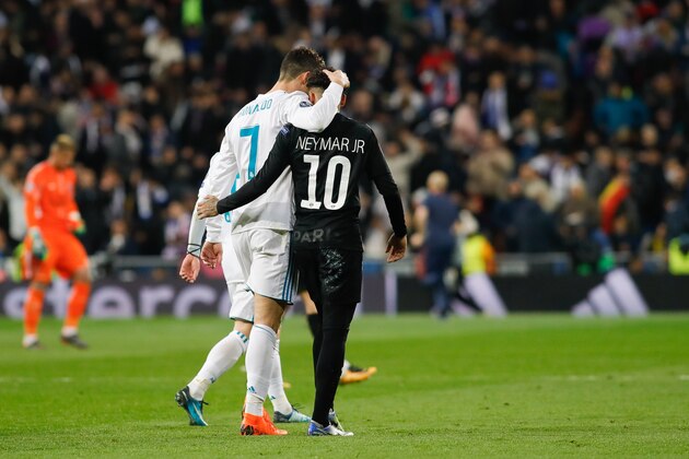 MADRID, SPAIN - FEBRUARY 14: Cristiano Ronaldo of Real Madrid and Neymar of Paris Saint-Germain walk during the UEFA Champions League Round of 16 First Leg match between Real Madrid and Paris Saint-Germain at Bernabeu on February 14, 2018 in Madrid, Spain. (Photo by TF-Images/ Getty Images)